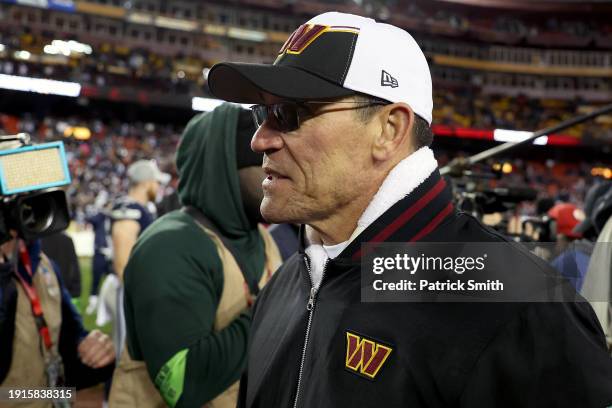 Washington Commanders head coach Ron Rivera walks off the field after the game against the Dallas Cowboys at FedExField on January 07, 2024 in...