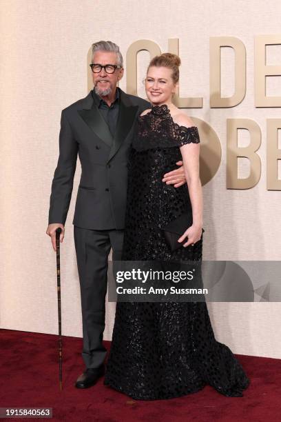 Alan Ruck and Mireille Enos attend the 81st Annual Golden Globe Awards at The Beverly Hilton on January 07, 2024 in Beverly Hills, California.