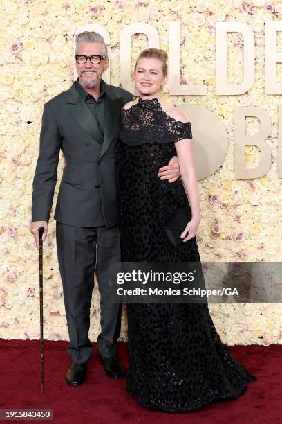 Alan Ruck and Mireille Enos attend the 81st Annual Golden Globe Awards at The Beverly Hilton on January 07, 2024 in Beverly Hills, California.