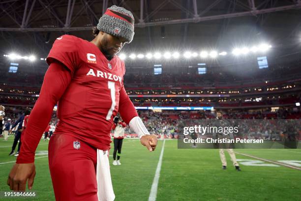 Kyler Murray of the Arizona Cardinals walks off the field after the game against the Seattle Seahawks at State Farm Stadium on January 07, 2024 in...