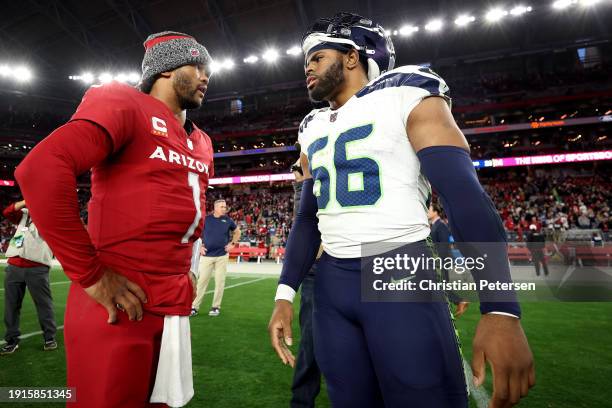 Kyler Murray of the Arizona Cardinals and Jordyn Brooks of the Seattle Seahawks talk after the game at State Farm Stadium on January 07, 2024 in...
