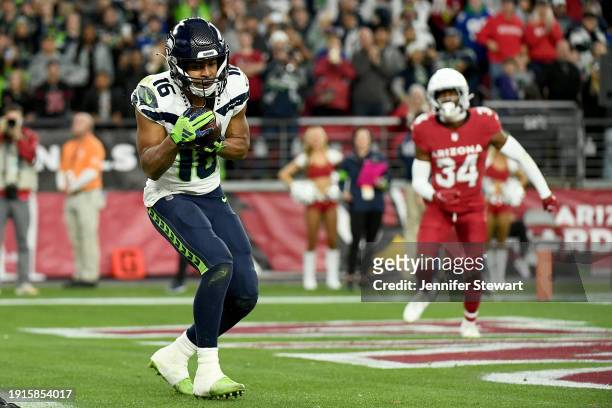 Tyler Lockett of the Seattle Seahawks catches a two point conversion during the fourth quarter against the Arizona Cardinals at State Farm Stadium on...