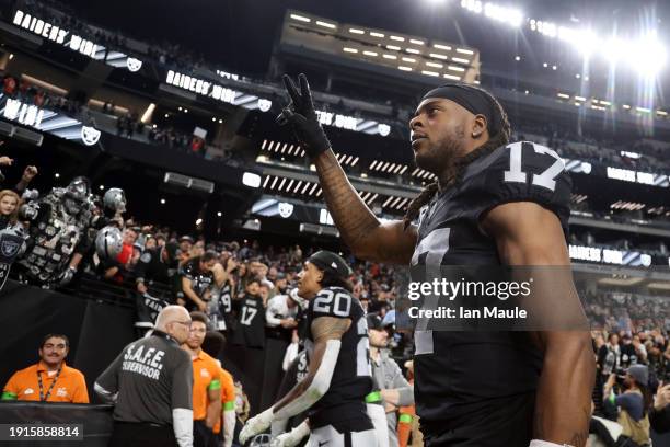 Davante Adams of the Las Vegas Raiders walks off the field after a win over the Denver Broncos at Allegiant Stadium on January 07, 2024 in Las Vegas,...