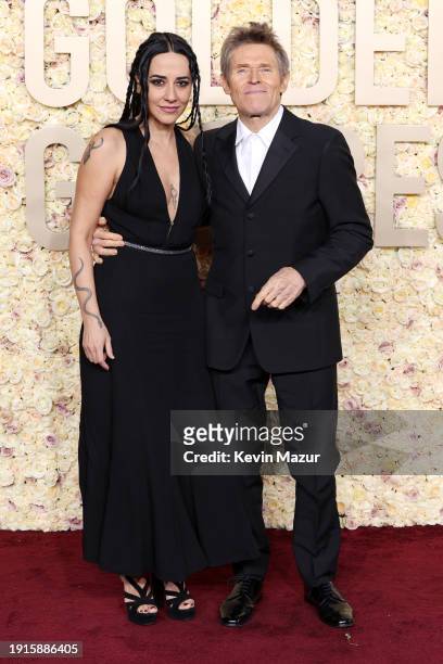 Giada Colagrande and Willem Dafoe attend the 81st Annual Golden Globe Awards at The Beverly Hilton on January 07, 2024 in Beverly Hills, California.
