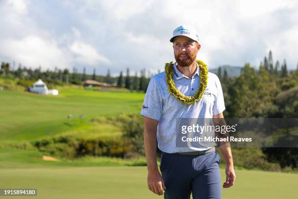 Chris Kirk of the United States looks on after winning on the 18th green during the final round of The Sentry at Plantation Course at Kapalua Golf...