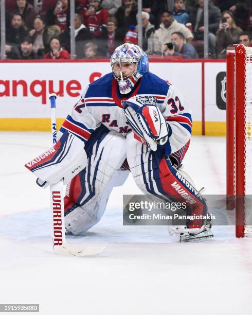 Jonathan Quick of the New York Rangers tends the net in overtime against the Montreal Canadiens at the Bell Centre on January 6, 2024 in Montreal,...