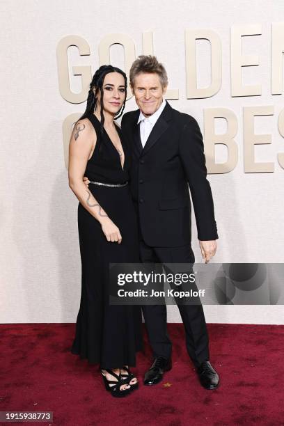 Giada Colagrande and Willem Dafoe attend the 81st Annual Golden Globe Awards at The Beverly Hilton on January 07, 2024 in Beverly Hills, California.