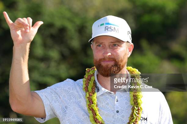 Chris Kirk of the United States reacts during the trophy ceremony after winning the final round of The Sentry at Plantation Course at Kapalua Golf...