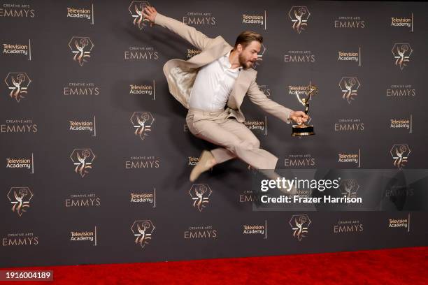 Derek Hough poses with the Outstanding Choreography For Variety Or Reality Programming award during the 2024 Creative Arts Emmys at Peacock Theater...