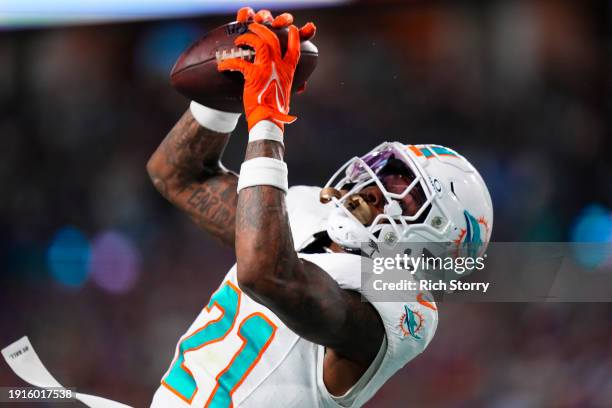 DeShon Elliott of the Miami Dolphins intercepts a pass during the first half against the Buffalo Bills at Hard Rock Stadium on January 07, 2024 in...