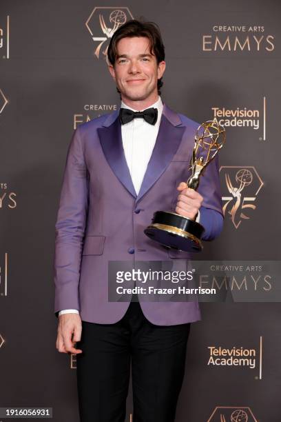 John Mulaney poses with the award for Outstanding Writing for a Variety Special award during the 2024 Creative Arts Emmys at Peacock Theater on...