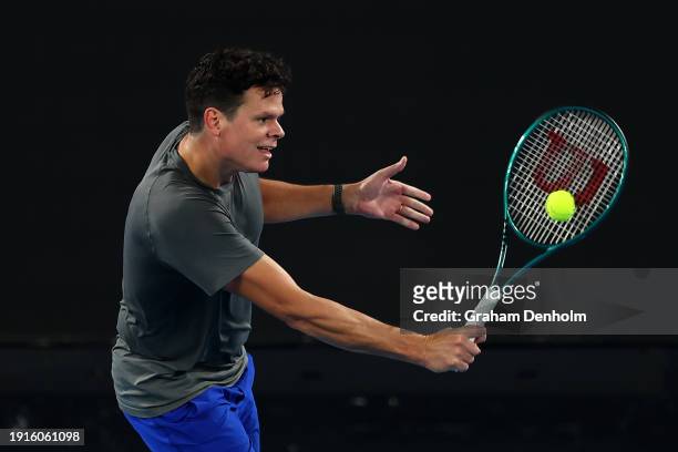 Milos Raonic of Canada plays a backhand during a training session ahead of the 2024 Australian Open at Melbourne Park on January 08, 2024 in...