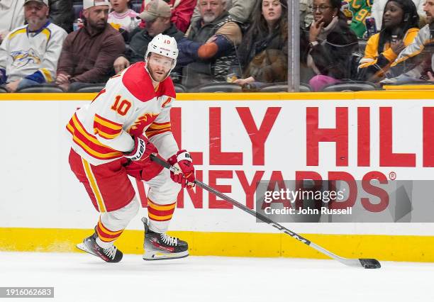 Jonathan Huberdeau of the Calgary Flames skates against the Nashville Predators during an NHL game at Bridgestone Arena on January 4, 2024 in...