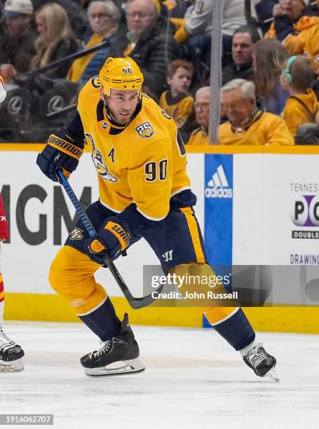 Ryan O'Reilly of the Nashville Predators skates against the Calgary Flames during an NHL game at Bridgestone Arena on January 4, 2024 in Nashville,...