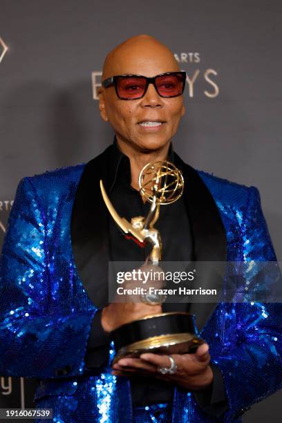 RuPaul poses with the Outstanding Host for a Reality or Competition Program award during the 2024 Creative Arts Emmys at Peacock Theater on January...