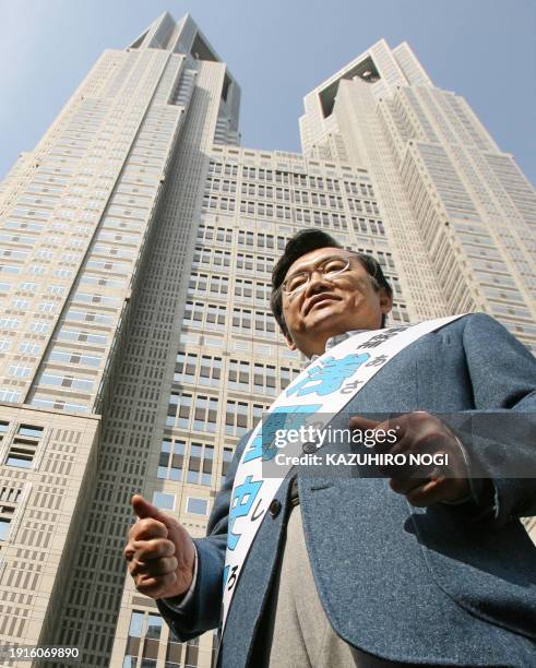 Former Miyagi Prefectural Governor Shiro Asano, a candidate for Tokyo governor polls, poses during his election campaign in front of the Tokyo...