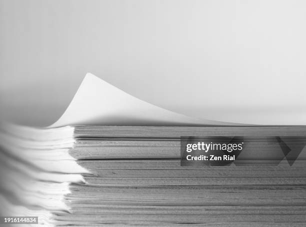 stack of white bond paper on white background - bond paper texture stock pictures, royalty-free photos & images