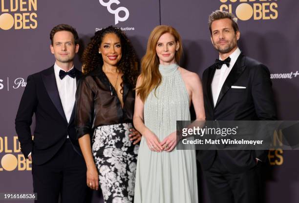 Patrick J. Adams, Gina Torres, Sarah Rafferty and Gabriel Macht pose in the press room during the 81st Annual Golden Globe Awards at The Beverly...