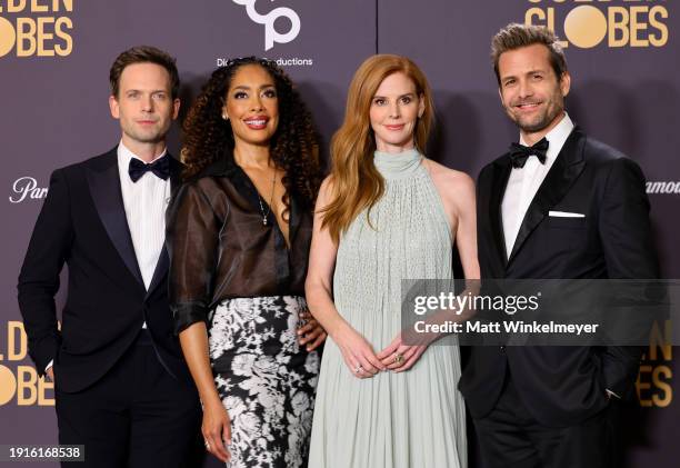 Patrick J. Adams, Gina Torres, Sarah Rafferty and Gabriel Macht pose in the press room during the 81st Annual Golden Globe Awards at The Beverly...