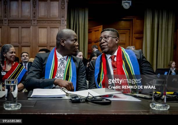 South Africa Minister of Justice Ronald Lamola and South African Ambassador to the Netherlands Vusimuzi Madonsela attend the International Court of...
