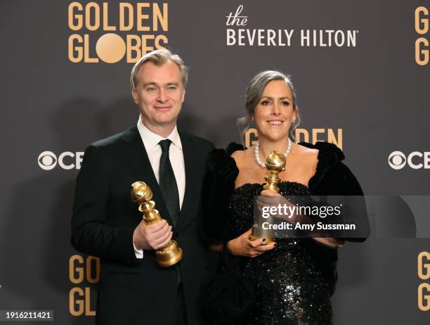 Christopher Nolan and Emma Thomas, winners of the Best Motion Picture - Drama for "Oppenheimer," pose in the press room during the 81st Annual Golden...