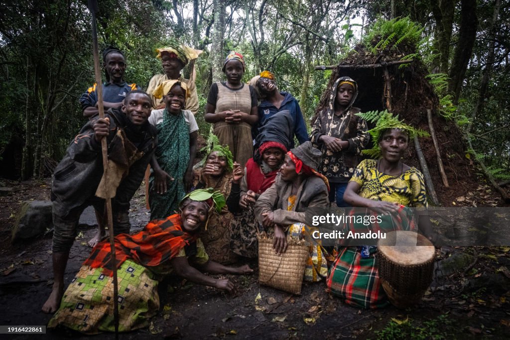Batwa Members of the Batwa tribe are seen as they live inside the... News ...