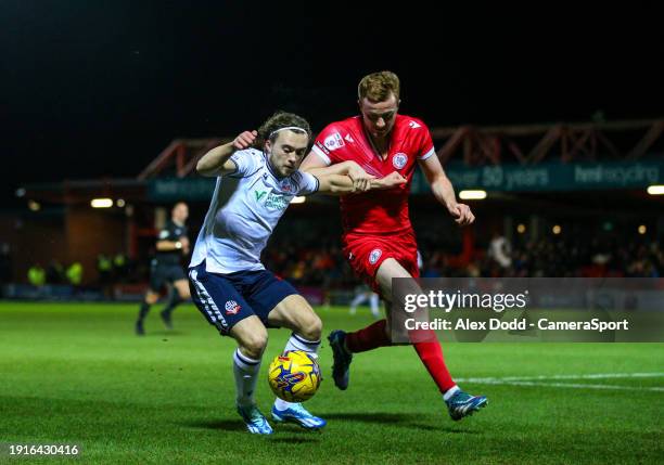 Bolton Wanderers' Luke Matheson takes on Accrington Stanley's Lewis Shipley during the Bristol Street Motors Trophy Third Round match between...