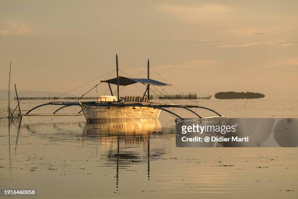 sunset over the panglao island in the philippines - bohol stock pictures, royalty-free photos & images