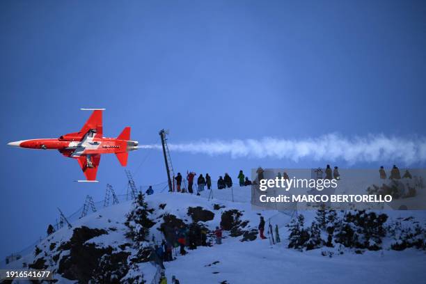 Swiss Air Force flies over the mountains prior to the start of the Men's Downhill race at the FIS Alpine Skiing World Cup event in Wengen,...