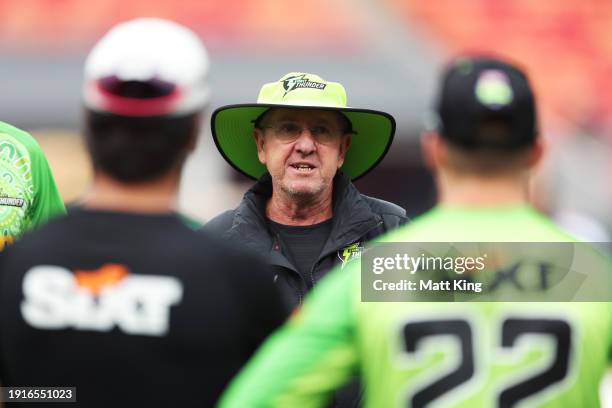 Thunder head coach Trevor Bayliss speaks to players prior to the BBL match between Sydney Thunder and Perth Scorchers at GIANTS Stadium, on January...