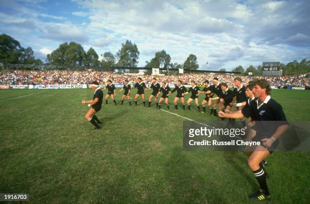 The New Zealand team do their Haka dance at the beginning of the Rugby World Cup match between New Zealand and Wales in the semi final in Brisbane,...