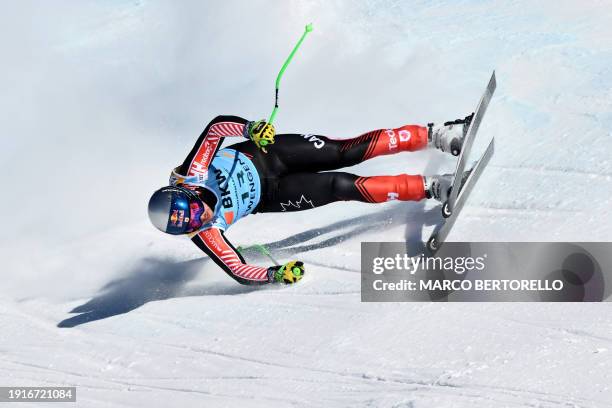 James Crawford Canada's slides down the course after a crash during in the Men's Downhill race at the FIS Alpine Skiing World Cup event in Wengen,...