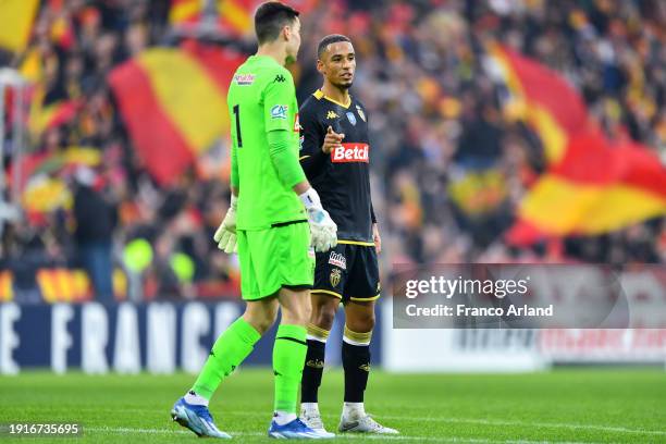 Thilo Kehrer of Monaco gives instructions to Radoslaw Majecki of Monaco during the French Cup match between RC Lens and AS Monaco at Stade...