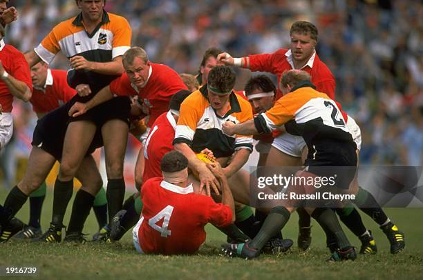 Paul Ackford of the British Lions wrestles with Tim Gavin of the Anzacs during the British Lions tour match between the Anzacs and the British Lions...
