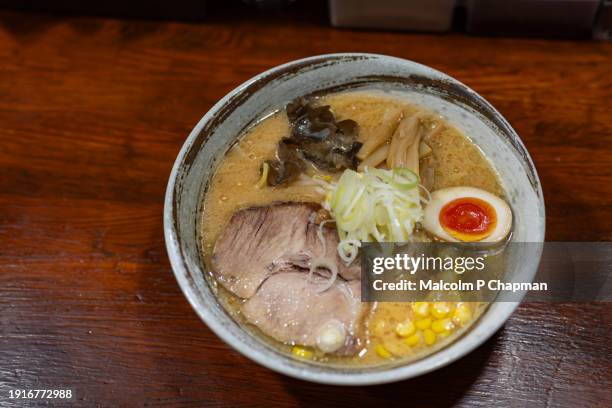 sapporo miso ramen with hokkaido butter and sweetcorn, sapporo, japan - miso ramen stock pictures, royalty-free photos & images