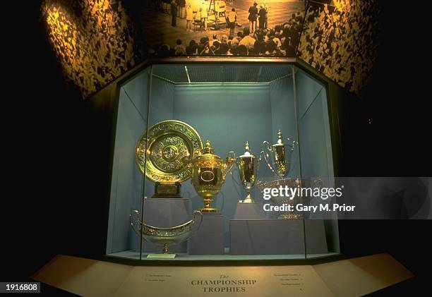 The Championship trophies are displayed in a glass cabinet in the All England Lawn Tennis Club Museum at Wimbledon in London. \ Mandatory Credit:...