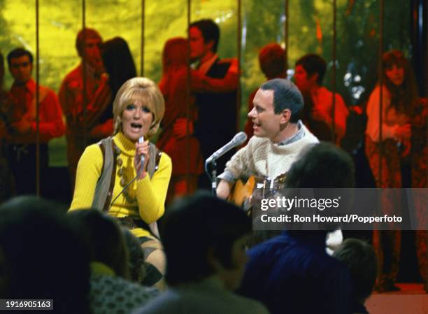 English singer Dusty Springfield performs the song 'Morning Please Don't Come' with her brother Tom Springfield in front of a studio audience on a...