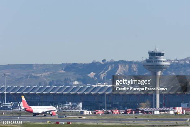 An airplane parked on the runway during the last day of the Iberia handling service strike at Adolfo Suarez Madrid-Barajas airport, January 8 in...