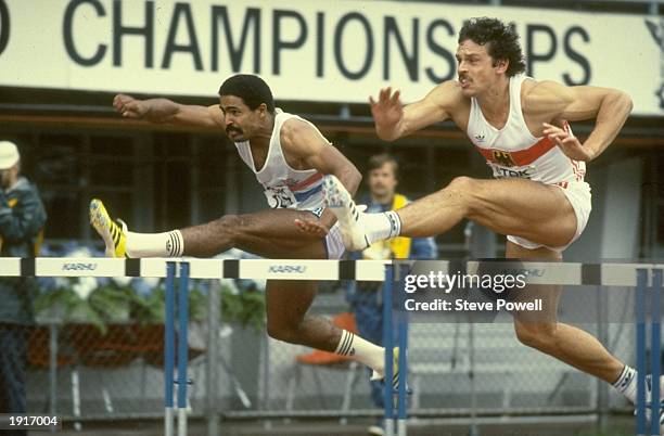 Daley Thompson of Great Britain and Jurgen Hingsen of West Germany in action during the 110 Metres Hurdling section of the Decathlon event at the...