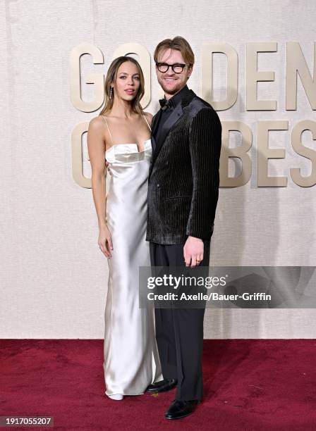 Claudia Sulewski and FINNEAS attend the 81st Annual Golden Globe Awards at The Beverly Hilton on January 07, 2024 in Beverly Hills, California.