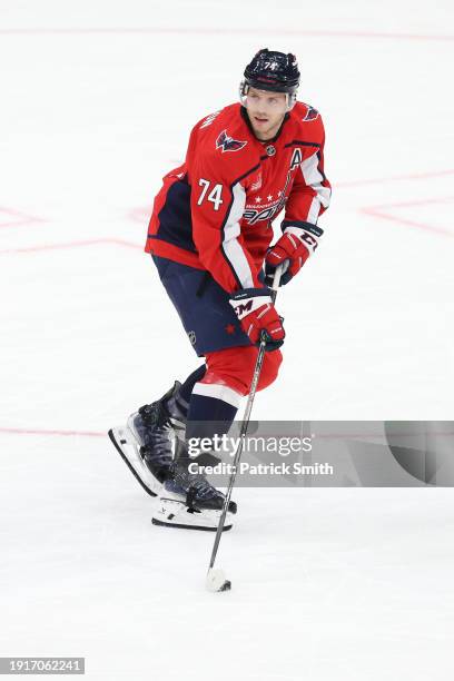 John Carlson of the Washington Capitals skates against the Carolina Hurricanes during the first period at Capital One Arena on January 05, 2024 in...