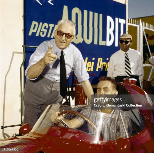 Enzo Ferrari and Phil Hill.