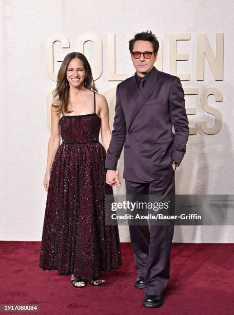 Susan Downey and Robert Downey Jr. Attend the 81st Annual Golden Globe Awards at The Beverly Hilton on January 07, 2024 in Beverly Hills, California.