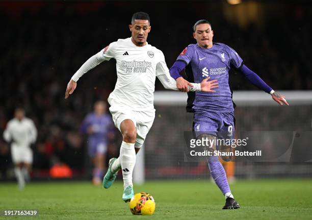 William Saliba of Arsenal is challenged by Darwin Nunez of Liverpool during the Emirates FA Cup Third Round match between Arsenal and Liverpool at...