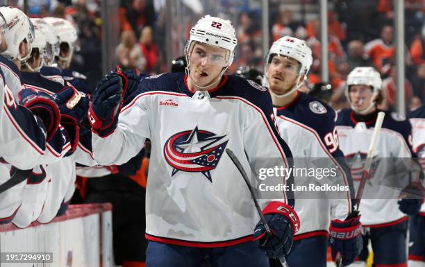 Jake Bean of the Columbus Blue Jackets celebrates a third period goal with teammates on the bench against the Philadelphia Flyers at the Wells Fargo...