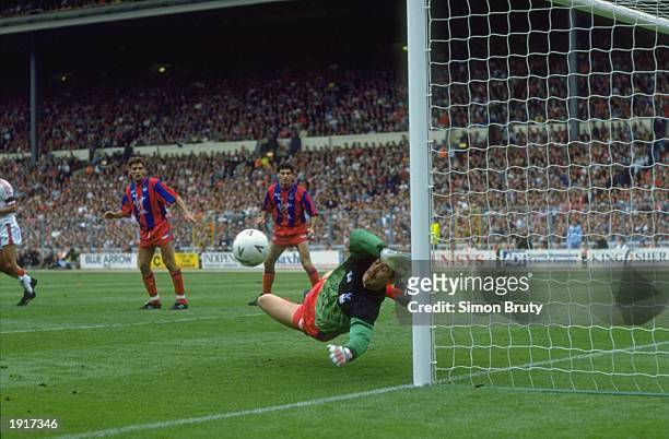 Nigel Martyn of Crystal Palace makes a great save during the FA Cup final against Manchester United at Wembley Stadium in London. The match ended in...