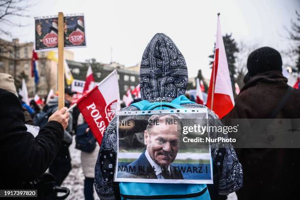 Anti Donald Tusk abnner is seen during right-wing 'Free Poles Protest' in front of parliament building in Warsaw, Poland on January 11, 2024. The...