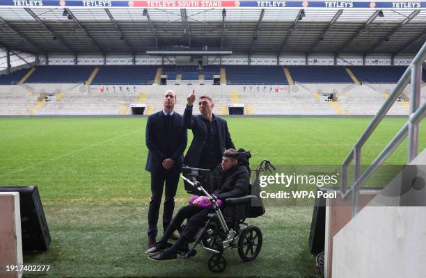 Prince William, Prince of Wales meets rugby coach Kevin Sinfield and former rugby league player Rob Burrow to congratulate them for raising awareness...