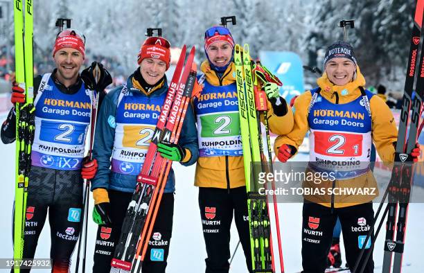 Germany's Philipp Nawrath, Germany's Benedikt Doll, Germany's Johannes Kuehn and Germany's Justus Strelow celebrate after placing second at the men's...