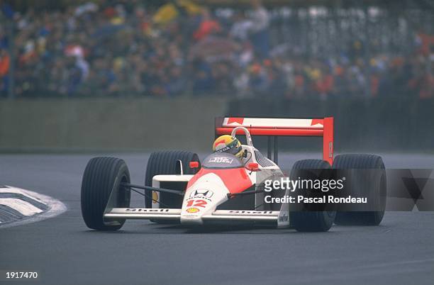 Ayrton Senna of Brazil cuts close to a corner in his McLaren Honda during the British Grand Prix at the Silverstone circuit in England. Senna...